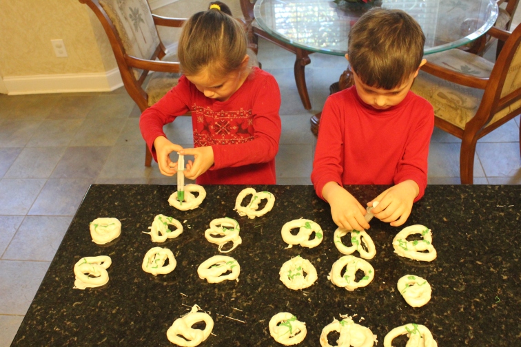 With Daddy H's syringe creation, making green stripes on the Pretzels